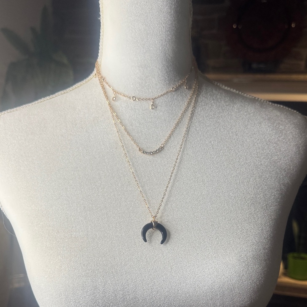 Elegant Gold and Black Crescent Necklace